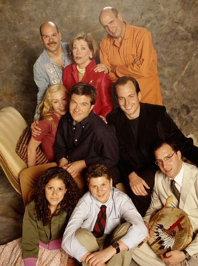 The cast of TV show Arrested Development sitting.