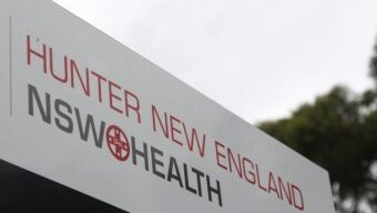A sign saying Hunter New England NSW Health