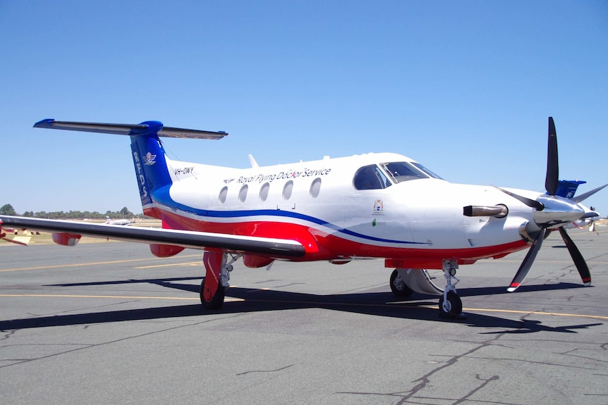 A new Royal Flying Doctor Service aircraft on the tarmac.