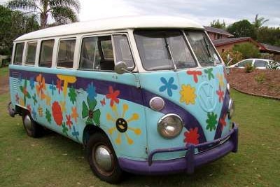 A Kombi painted in flowers.