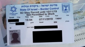 A small card said State of Israel border control.