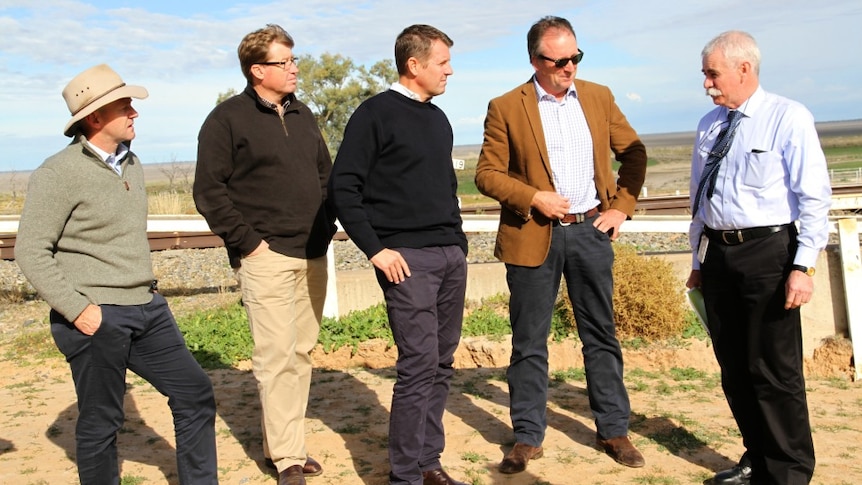 Niall Blair, Troy Grant, Mike Baird, Kevin Humphries talk to John Coffey outside.