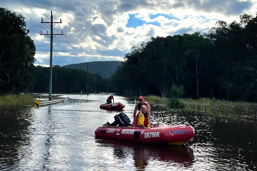 People on a surf life saving inflatable rescue boat.