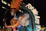 Nations United...a transvestite on a surfboard features on the 'Australia' float.