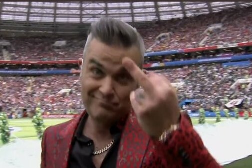 Robbie Williams gives the finger during World Cup opening ceremony