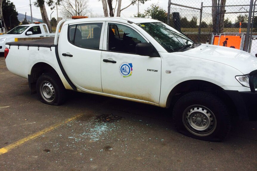 Vehicles had tyres slashed and windows smashed.