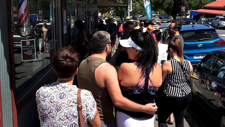 People queue for the ANZ ATM at Willunga