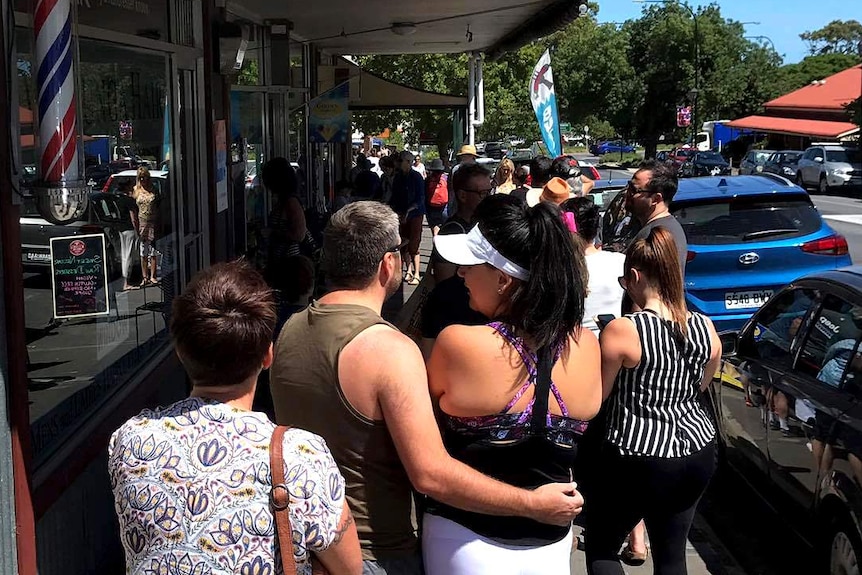 People queue for the ANZ ATM at Willunga