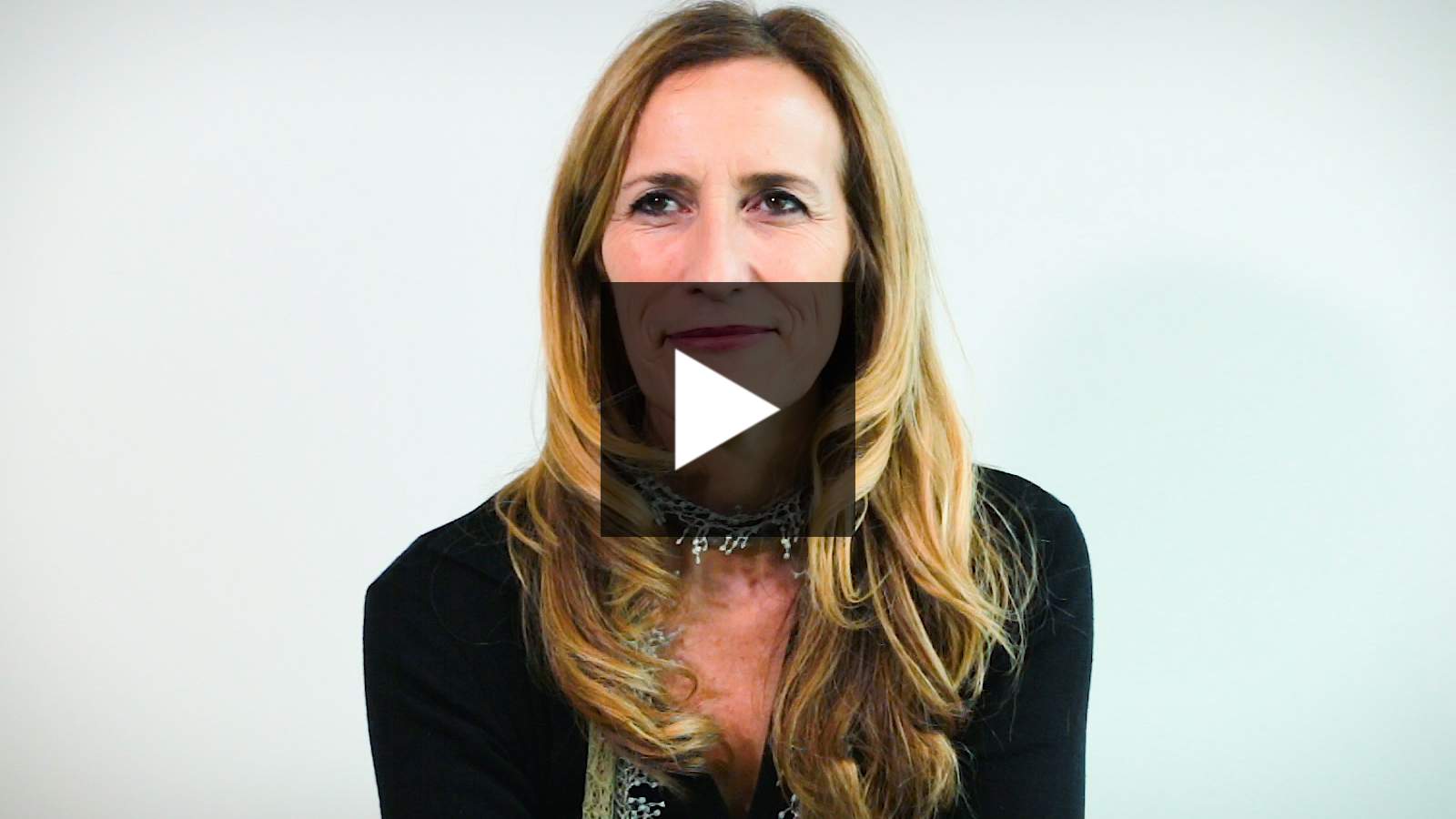 An image of Professor Sarah Wilson with title overlay saying "What happens to your brain when you sing?"