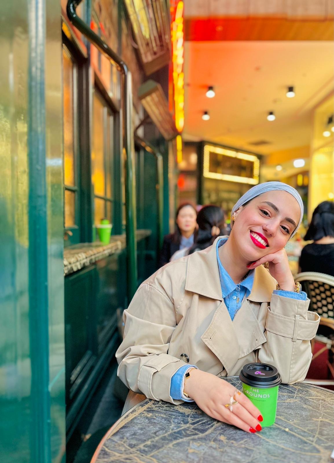 A close up of a smiling woman.