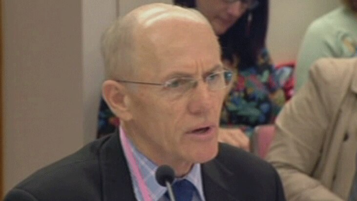 TV still of acting CMC chairman Ken Levy appearing before a parliamentary committee in Brisbane. Mon May 5, 2014