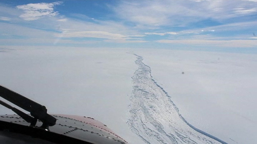 An ice sheet in Antarctica breaking away.
