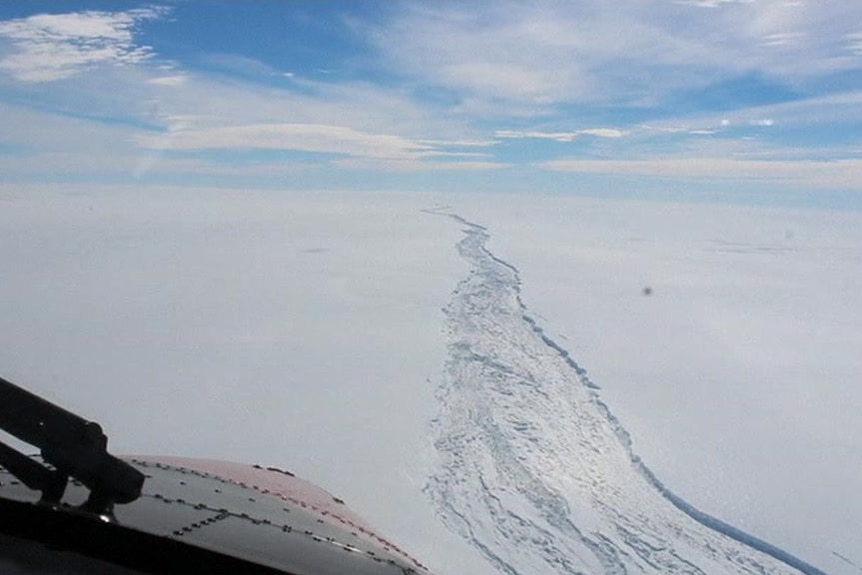 An ice sheet in Antarctica breaking away.