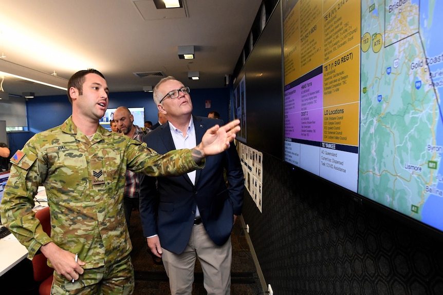 Prime Minister Scott Morrison gets an ADF flood briefing 