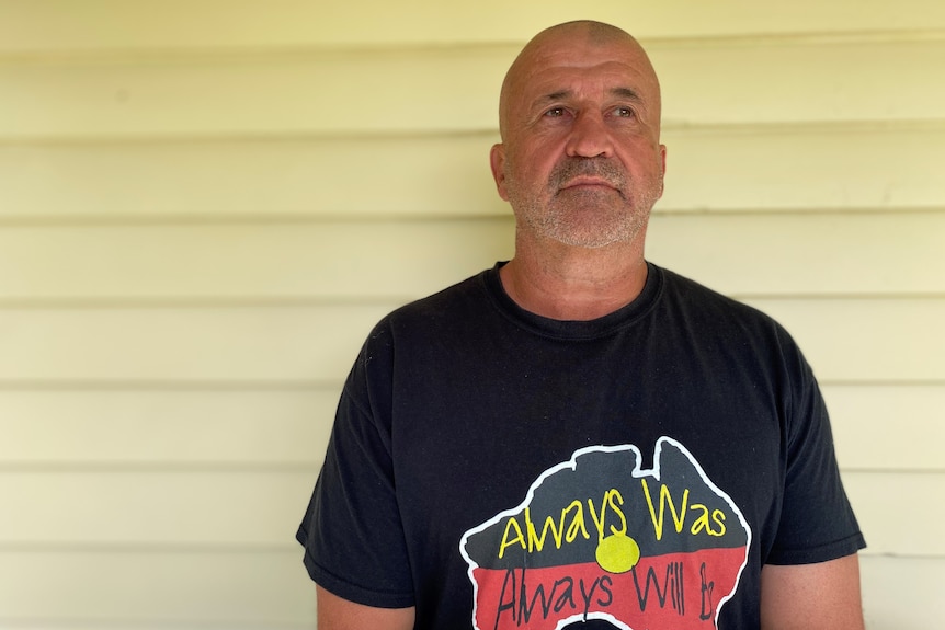 Rod Owen in a black t-shirt with the map of Australia on it, which says 'Always Was, Always Will Be'.