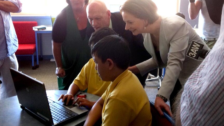 Julia Gillard and Peter Garrett speak with students at Bethany Primary School.