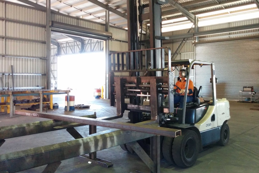 A forklift operator at work at Jake's Steel and Welding, a NT small business.