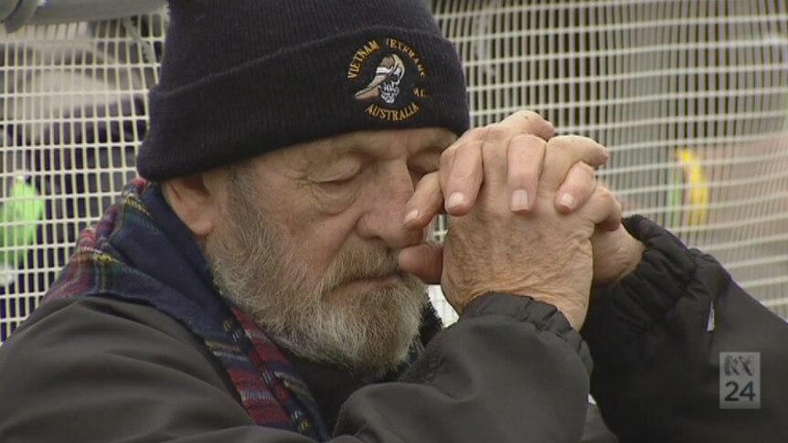 Veteran praying at Lone Pine