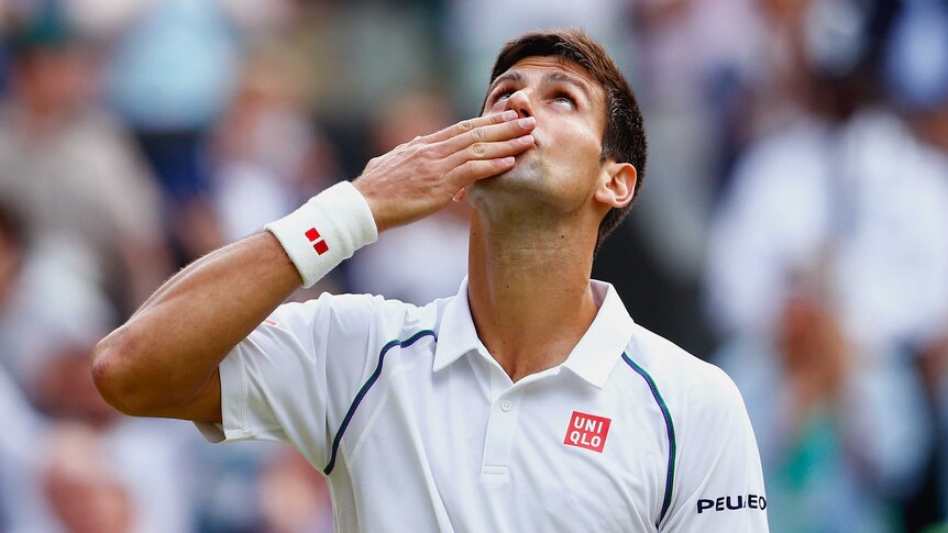 Novak Djokovic celebrates after winning his 2015 Wimbledon quarter-final against Marin Cilic.