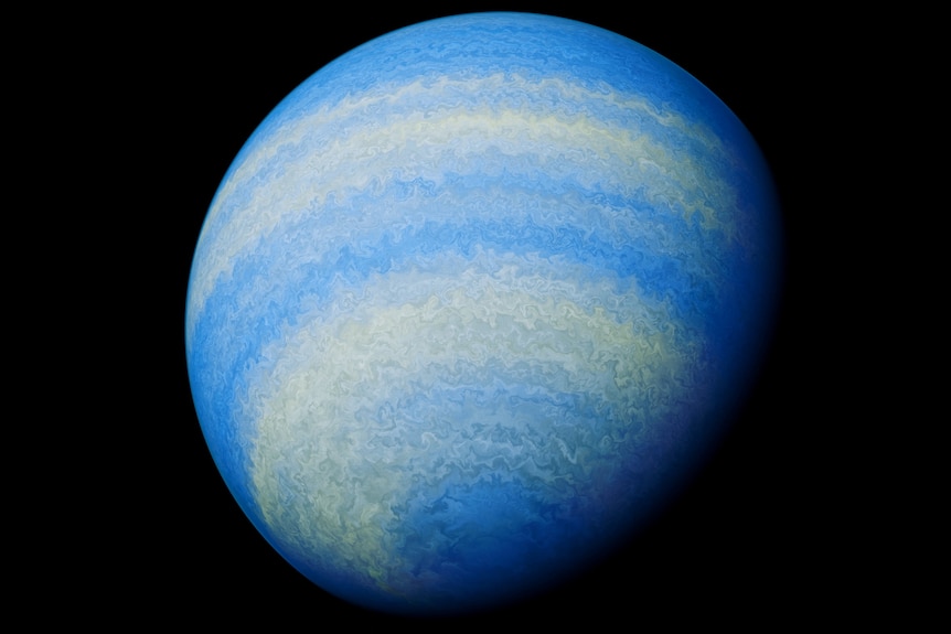 A swirly blue-green planet sitting in space partially illuminated