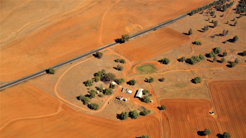 An aerial shot shows dry land around Dubbo airport.