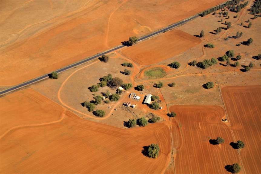An aerial shot shows dry land around Dubbo airport.