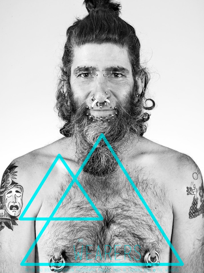 Individuals with body art and modifications are the subjects of striking portraits for the community project.