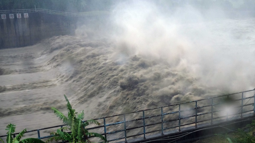 Churning waters in the Jhihtan Dam is seen in Xindian district.