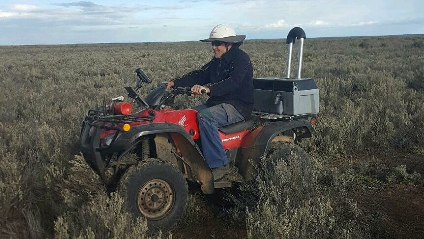 Neds Corner Station contractor Trent Wilkins GPS maps rabbit warrens at Neds Corner Station on his quad bike.