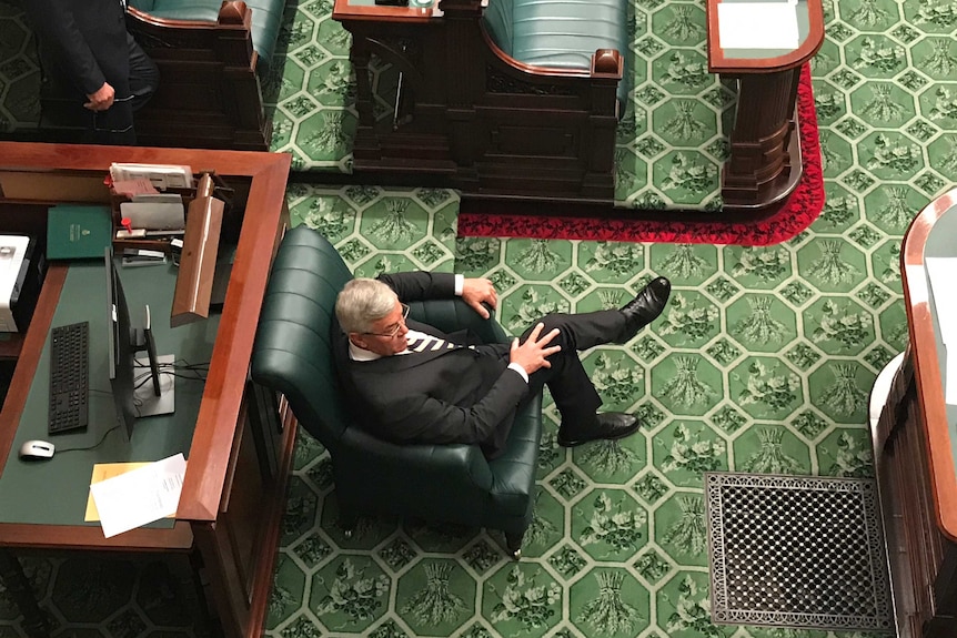 Duncan McFetridge sitting in Parliament.