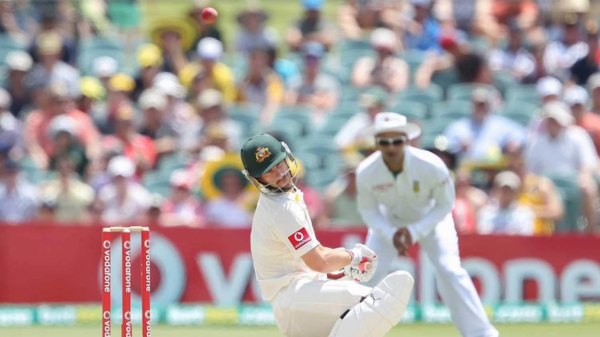 Evasive action... Matthew Wade ducks a bouncer.