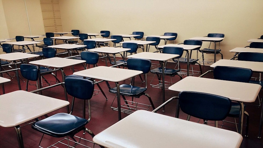 A classroom of empty desks