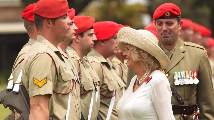 Camilla, Duchess of Cornwall, inspects the Royal Guard and Band