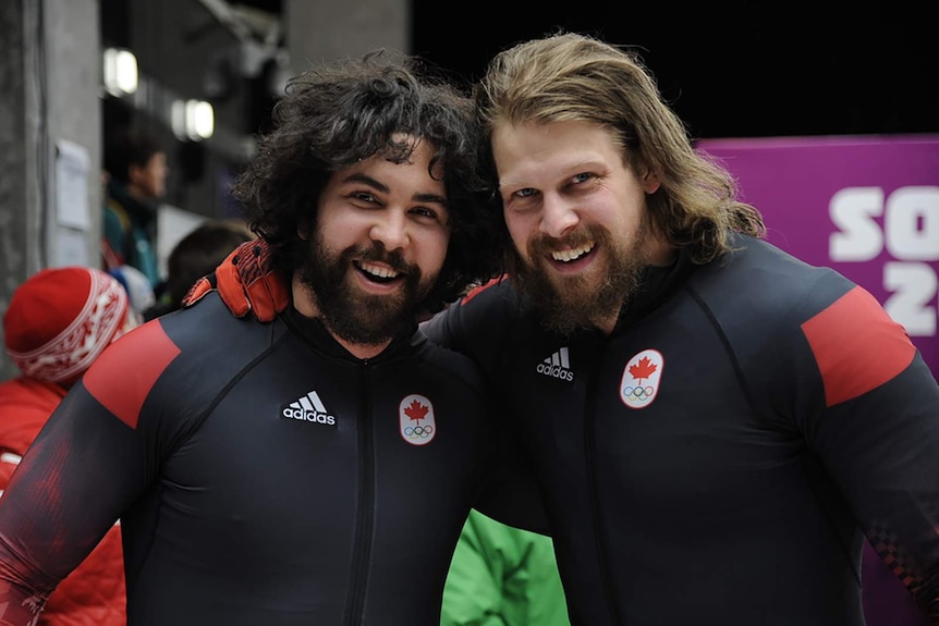 Chris in lycra with a teammate.