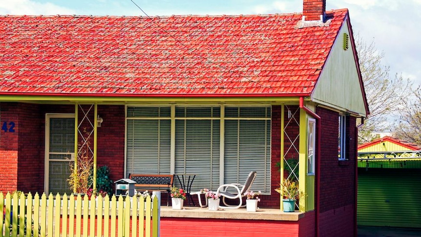 A picture of a typical suburban 1950s Australian brick bungalow
