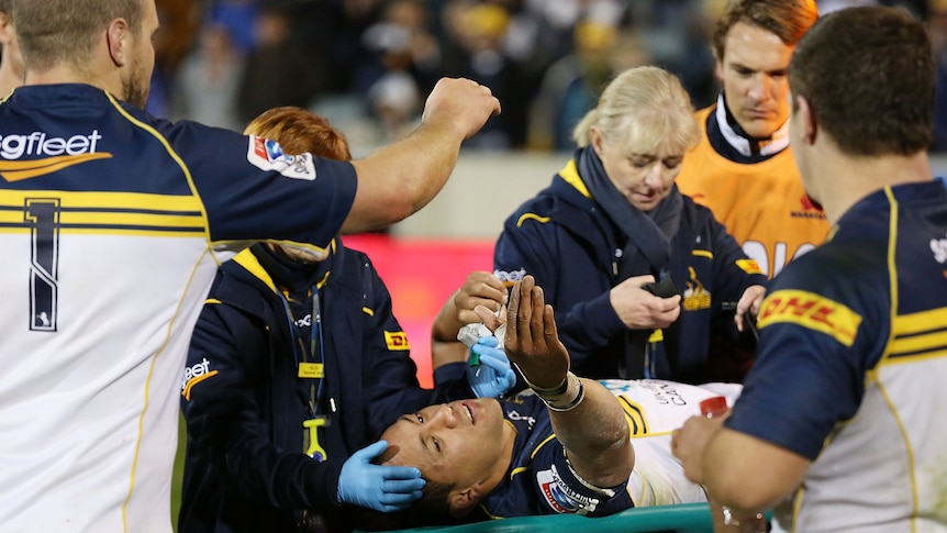 Season over ... Christian Lealiifano leaves the field after breaking his ankle against the Waratahs