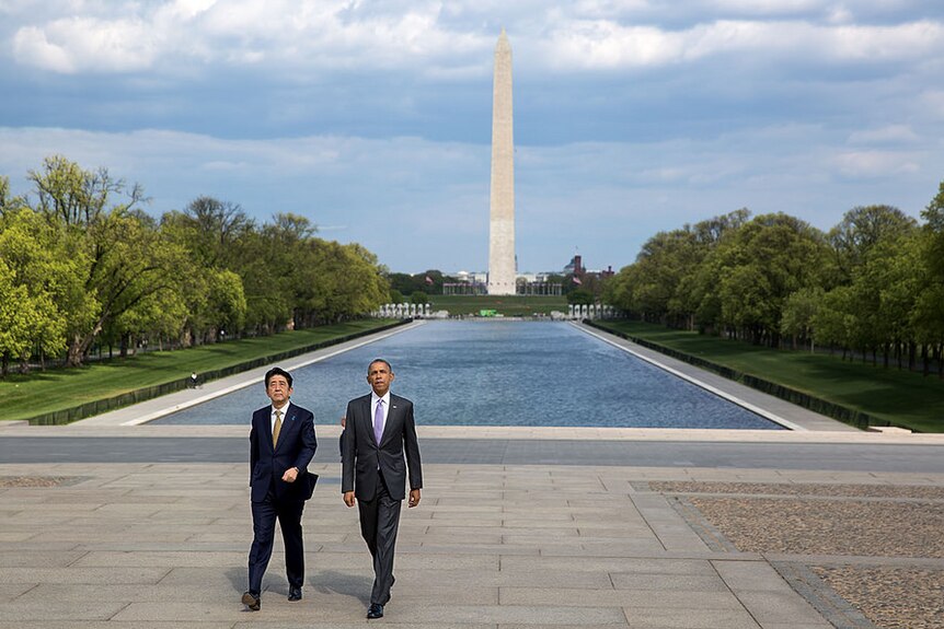 Mr Abe and Mr Obama walk from the Reflecting Pool in Washington DC