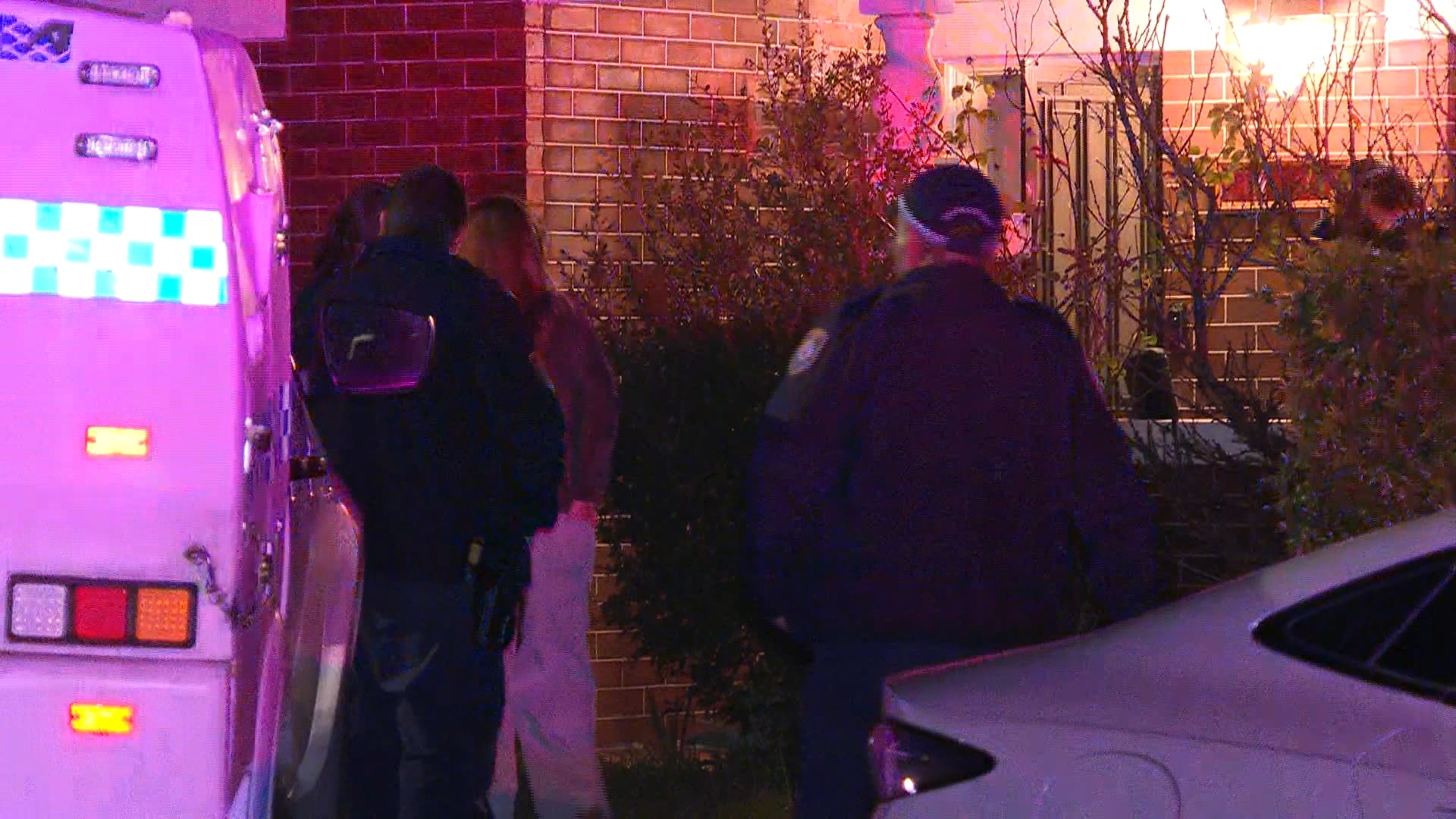 Police outside a home.