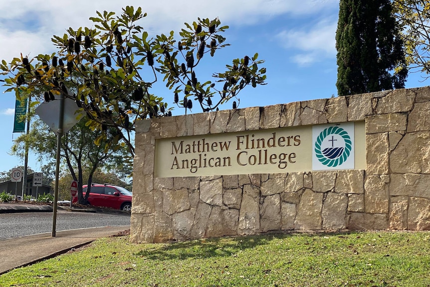 A sign of the school name outside the facility