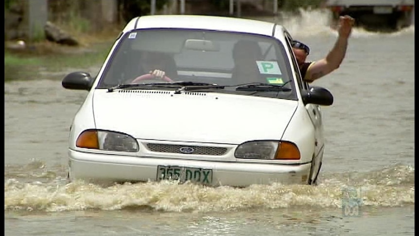 In Brisbane, motorists are again being warned not to park their cars in low-lying riverside suburbs.