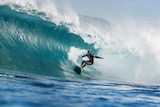 A surfer catches a barrel at the  2014 Margaret River Pro.