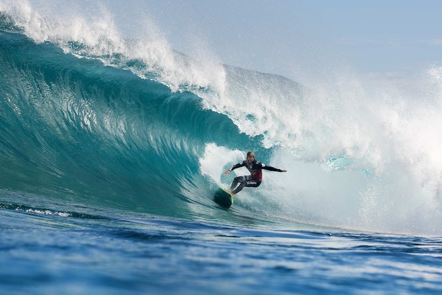 A surfer catches a barrel at the  2014 Margaret River Pro.