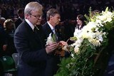 Victims honoured: Prime Minister Rudd and Victorian Premier John Brumby lay flowers in remembrance.