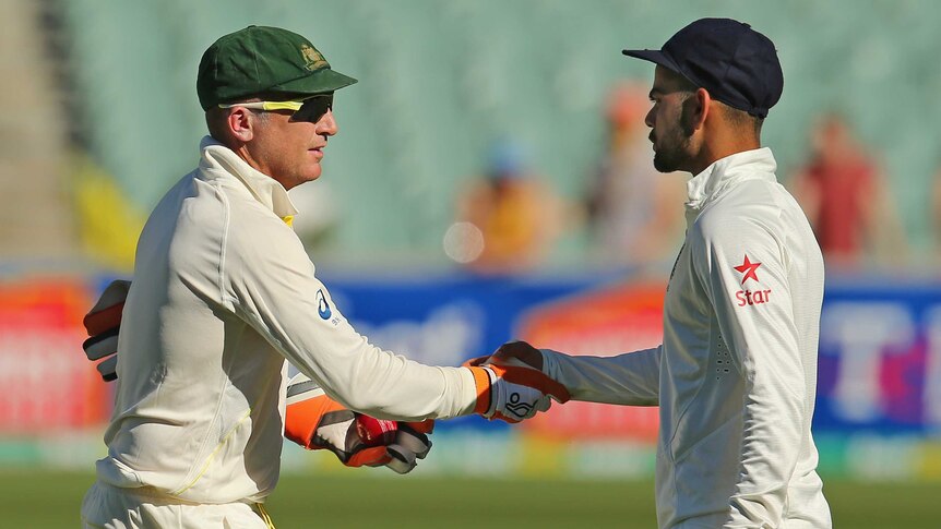 Leadership role ... Brad Haddin shakes hands with Virat Kohli after Australia's win