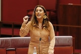 Lidia Thorpe standing in the senate in the middle of a sentence during question time
