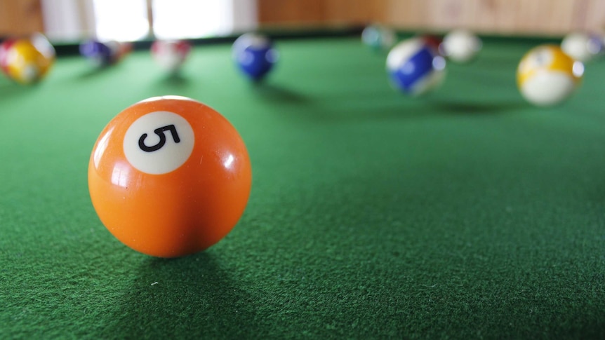 Pool balls sitting on a table