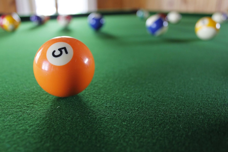 Pool balls sitting on a table