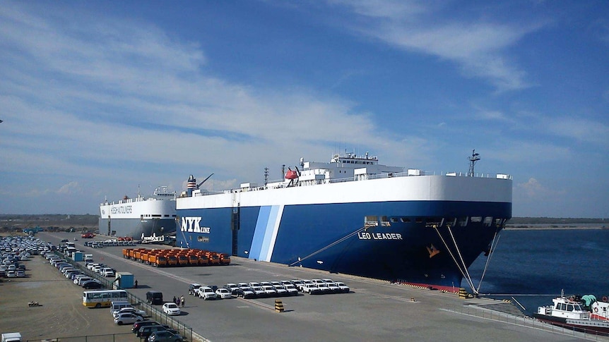 Two large ships are docked at the Hambantota Port in Sri Lanka in this 2013 file photo.