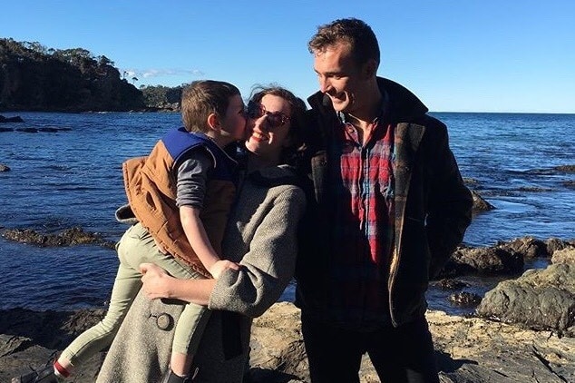 Jessica Friedmann with her husband and child on a coastal holiday.