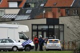 Police operate outside a childcare centre in Dendermonde, near Brussels